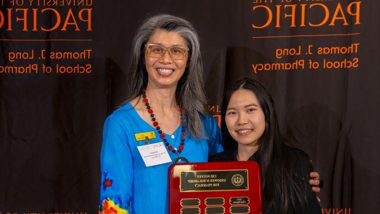 Alumni donor Chi Nguyen with PharmD student scholarship recipient 